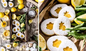Osterkekse mit Zitrone und Puderzucker, gefüllt mit leckerer Zitronencreme. Frische Zitronen und grüne Blätter umgeben die süßen Leckereien.